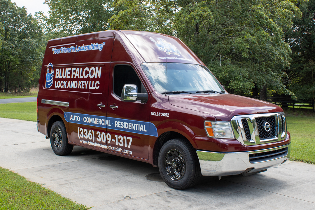 A commercial van with full-wrap company branding.