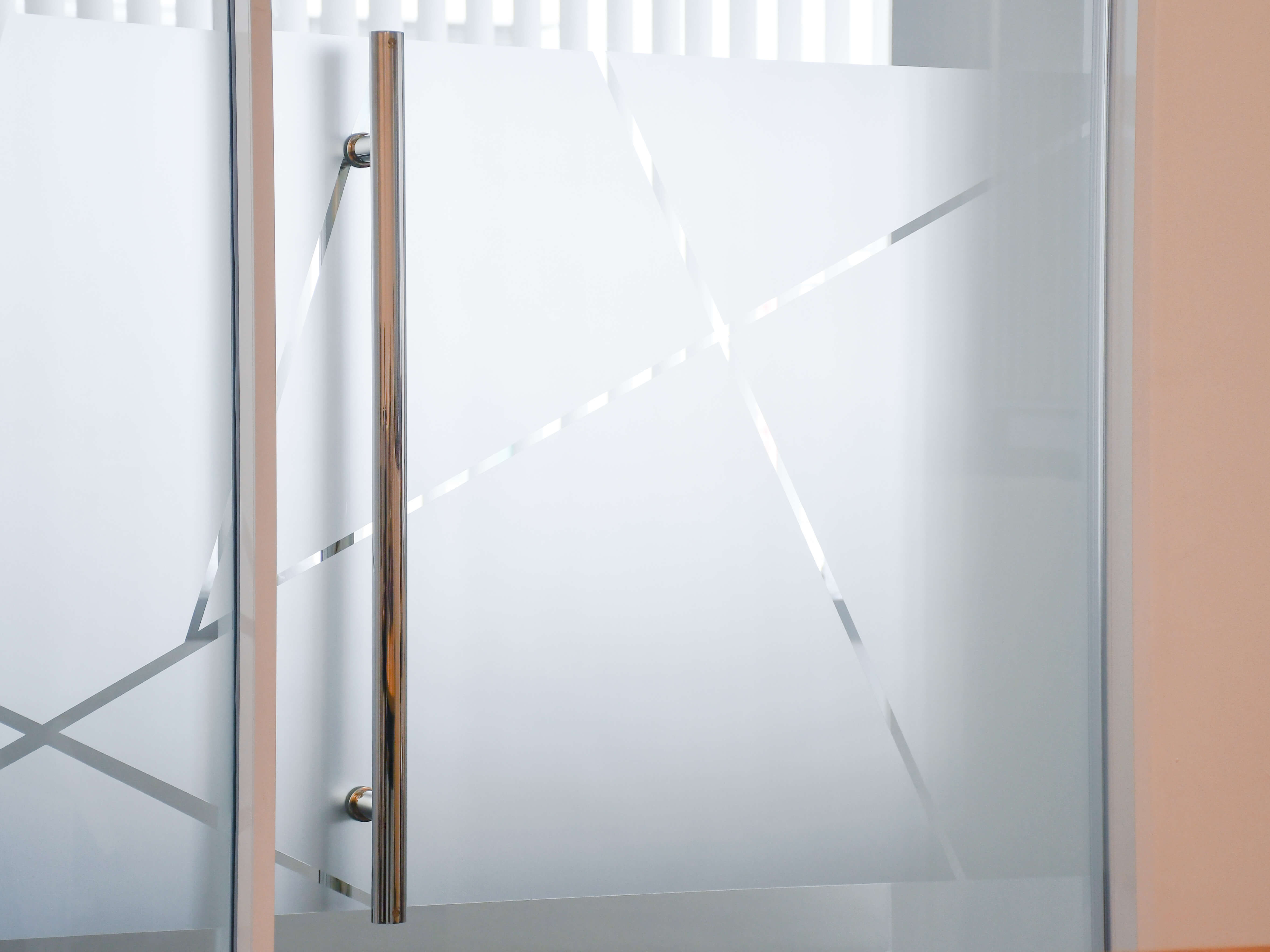A modern glass conference room with frosted vinyl for privacy.